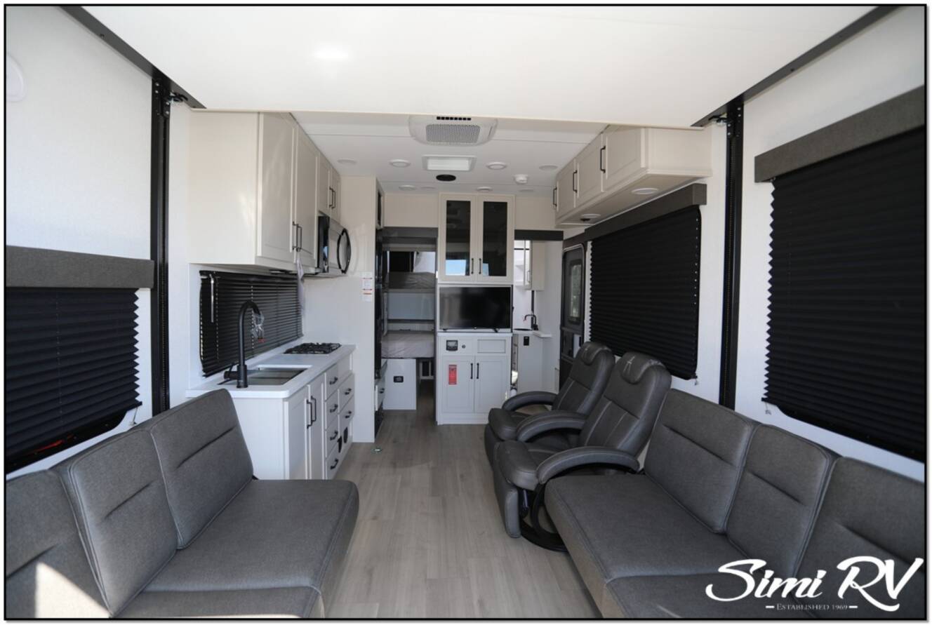 A photo of this 2026 Grand Design Momentum G Class (Travel Trailer) 21G