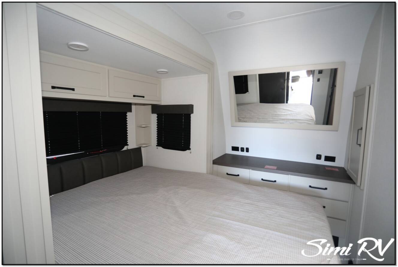 A photo of this 2026 Grand Design Momentum G Class (Travel Trailer) 21G