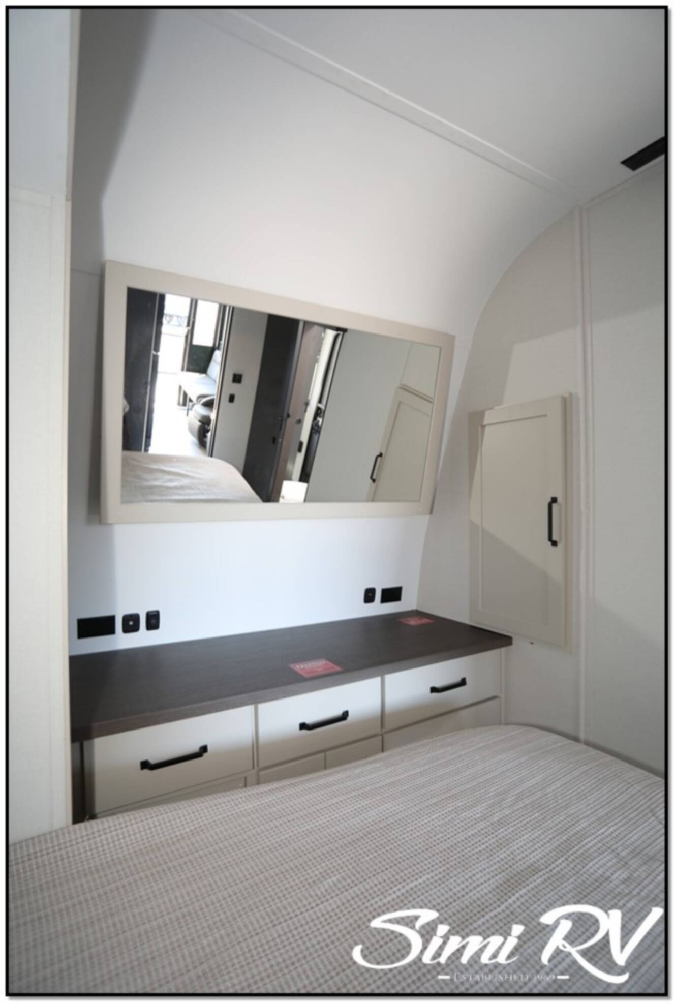 A photo of this 2026 Grand Design Momentum G Class (Travel Trailer) 21G