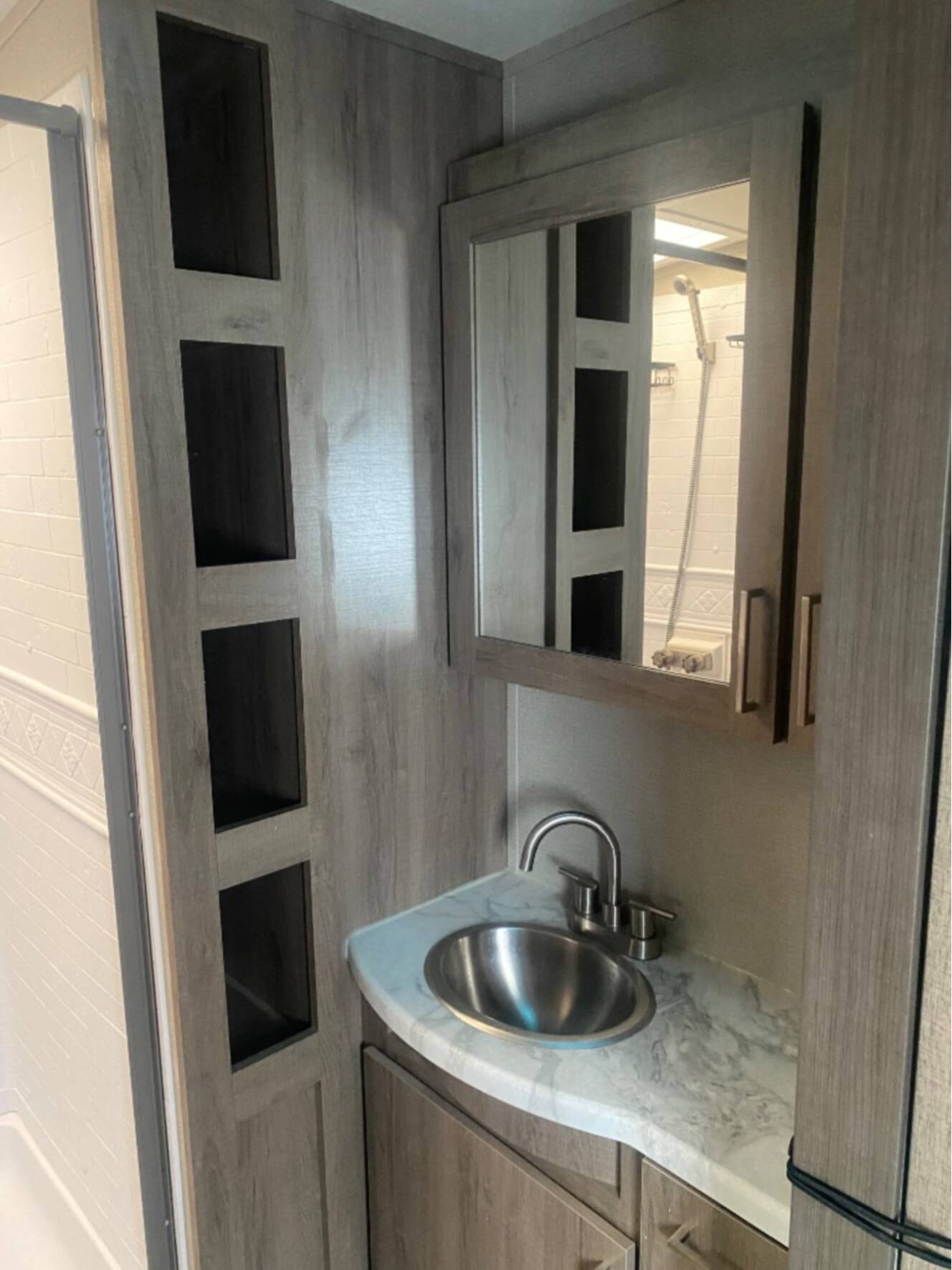 A photo of this 2022 Grand Design Imagine 2970RL