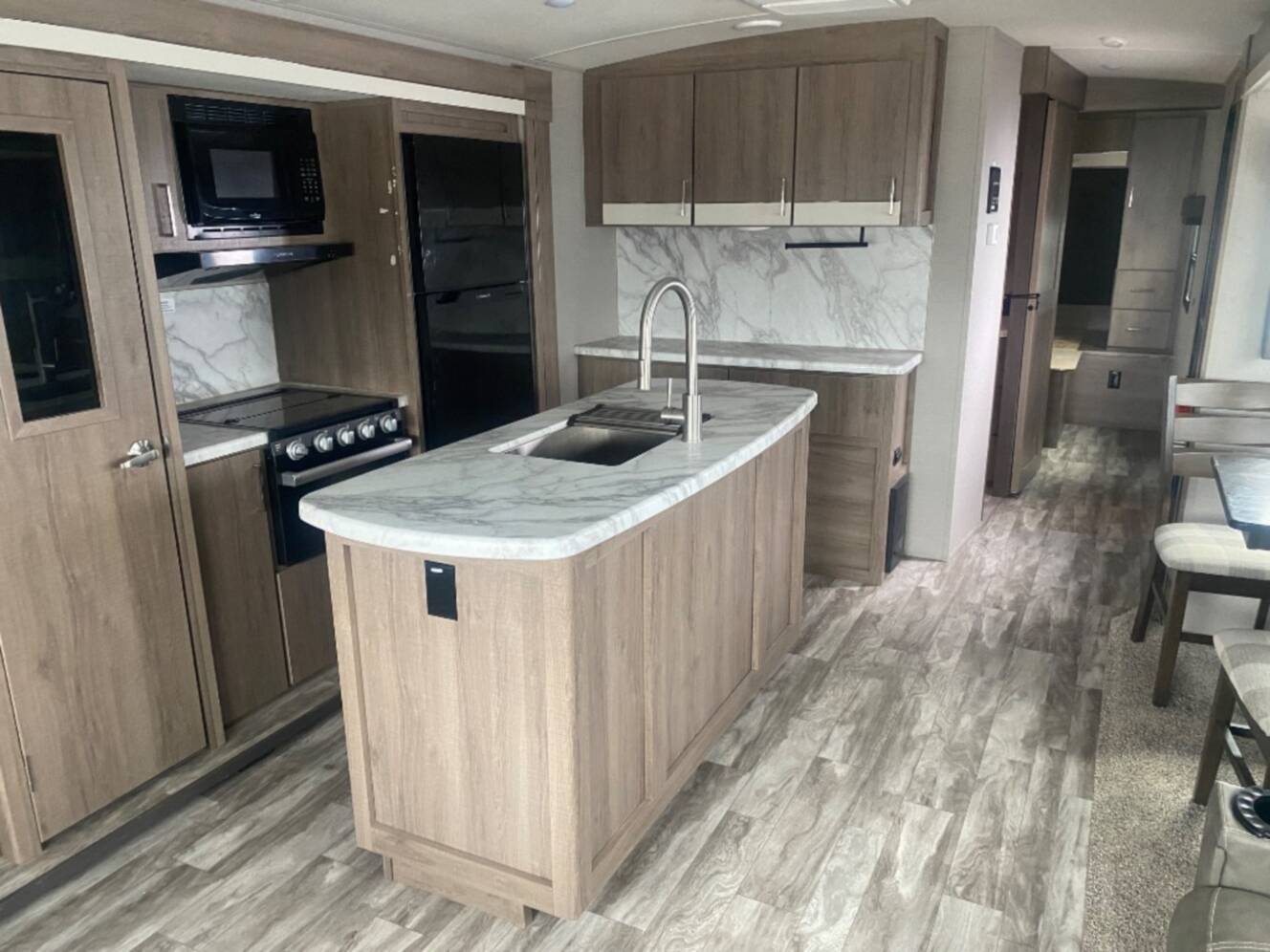 A photo of this 2022 Grand Design Imagine 2970RL