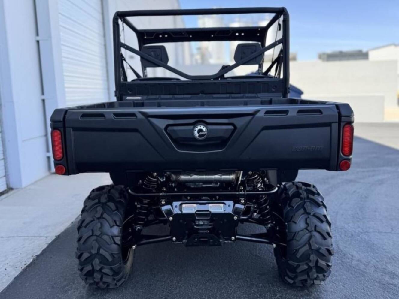A photo of this 2025 Can-Am Defender DPS HD10 Compass Green