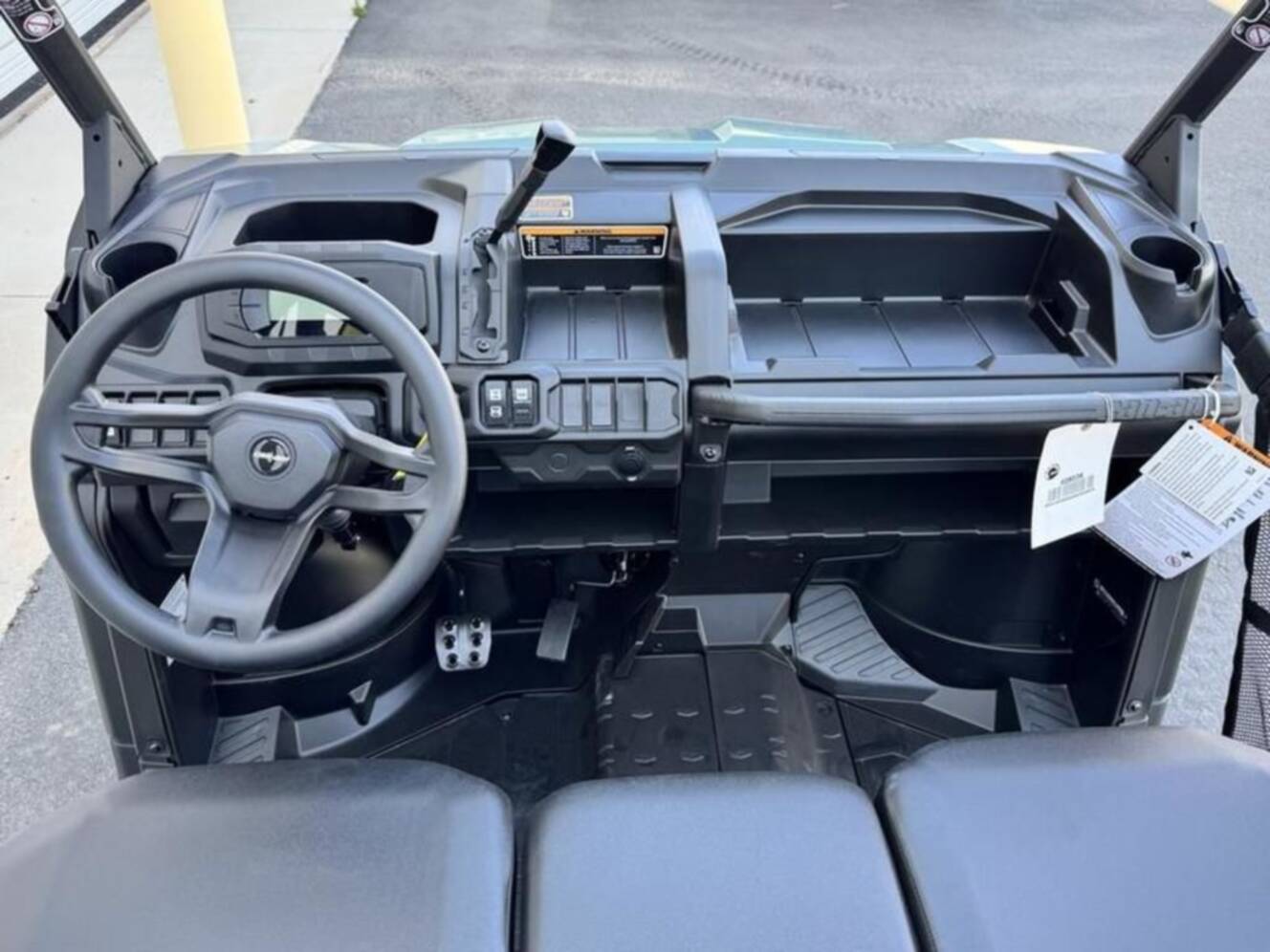 A photo of this 2025 Can-Am Defender DPS HD10 Compass Green