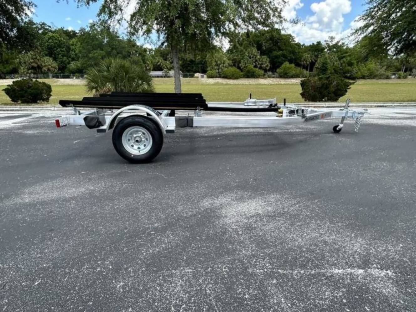 A photo of this 2025 Magic Tilt DOUBLE PWC TRAILER