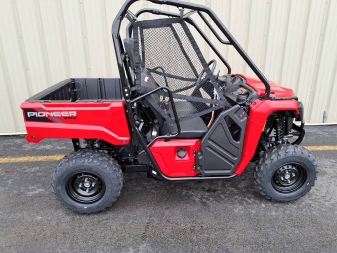 A photo of this 2026 Honda® Pioneer 520