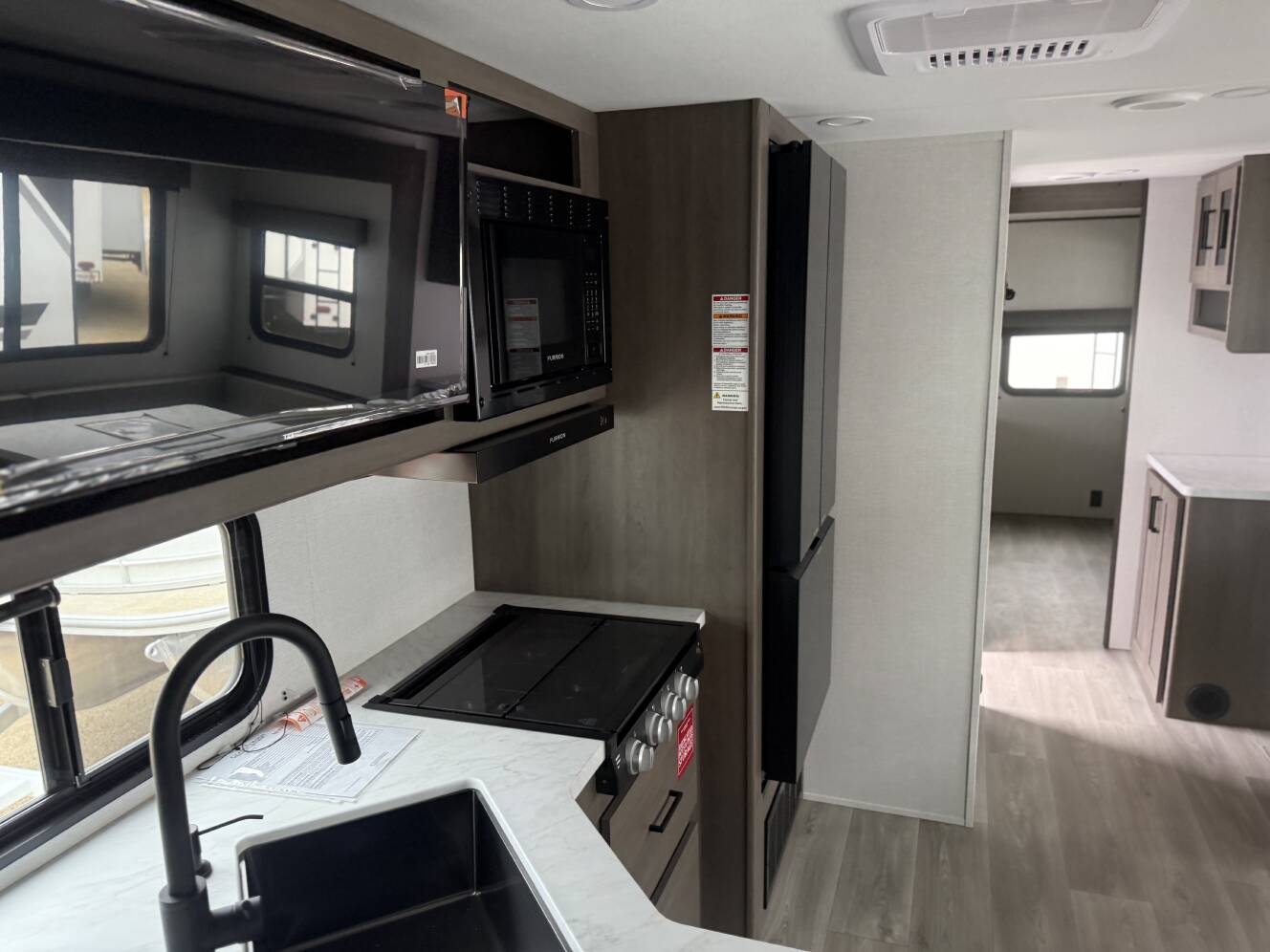 A photo of this 2026 Grand Design Transcend 325BHT 325BHT
