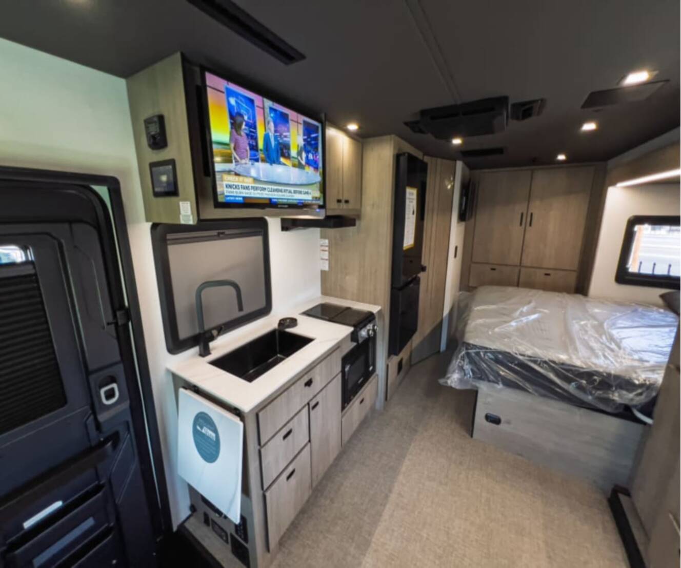 A photo of this 2027 Grand Design LINEAGE SERIES M 25FW-FBP