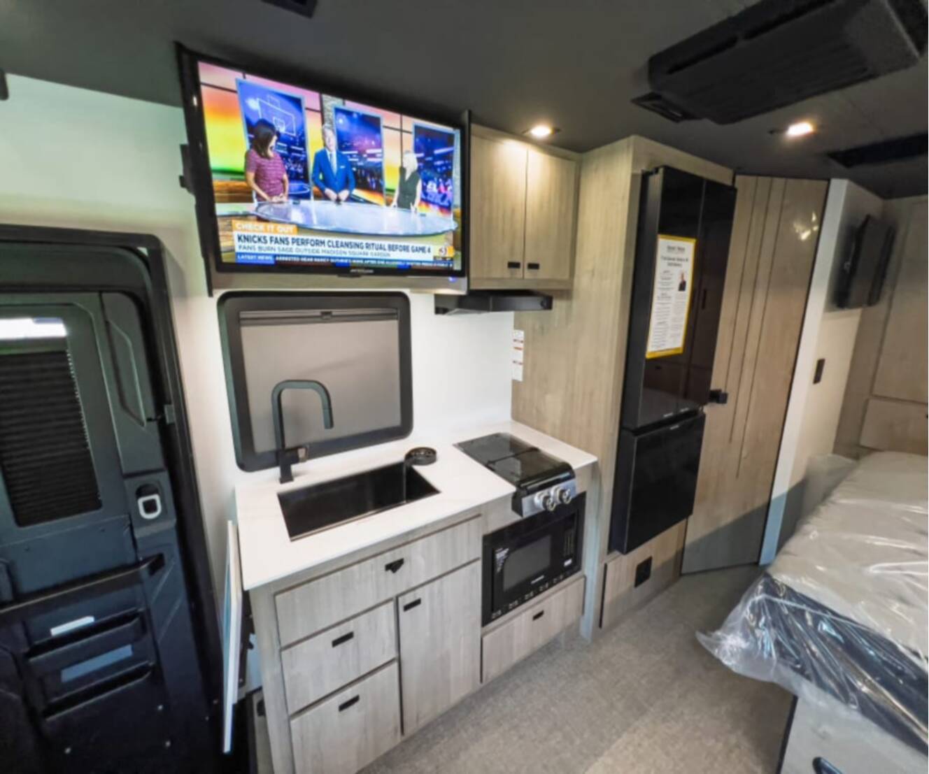 A photo of this 2027 Grand Design LINEAGE SERIES M 25FW-FBP