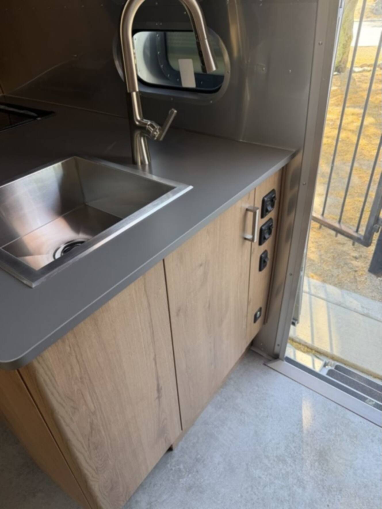 A photo of this 2026 Airstream Trade Wind 25FBT
