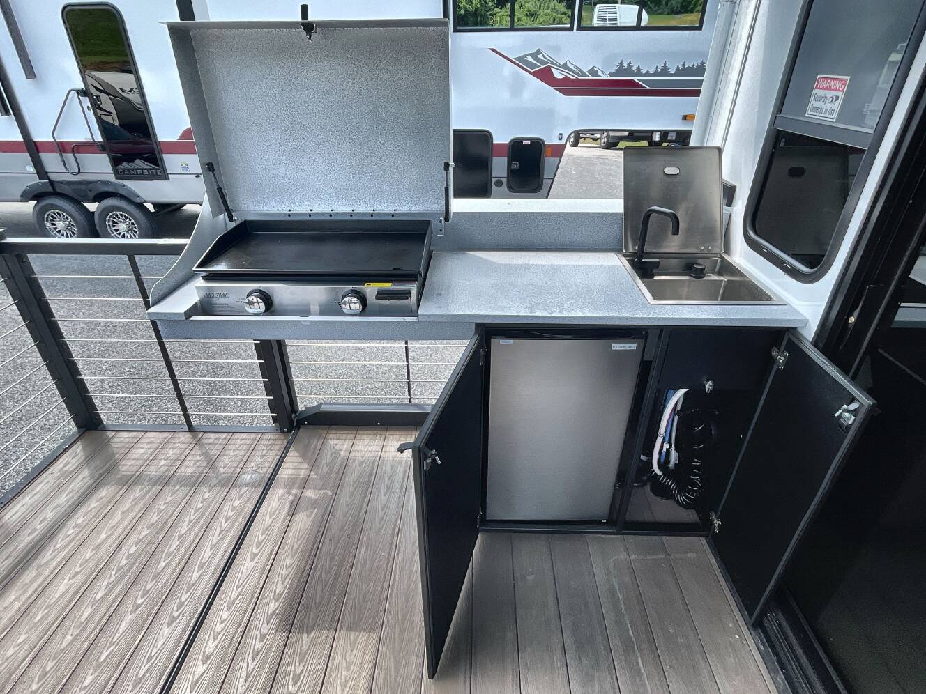 A photo of this 2025 Forest River WILDWOOD 32VERANDA