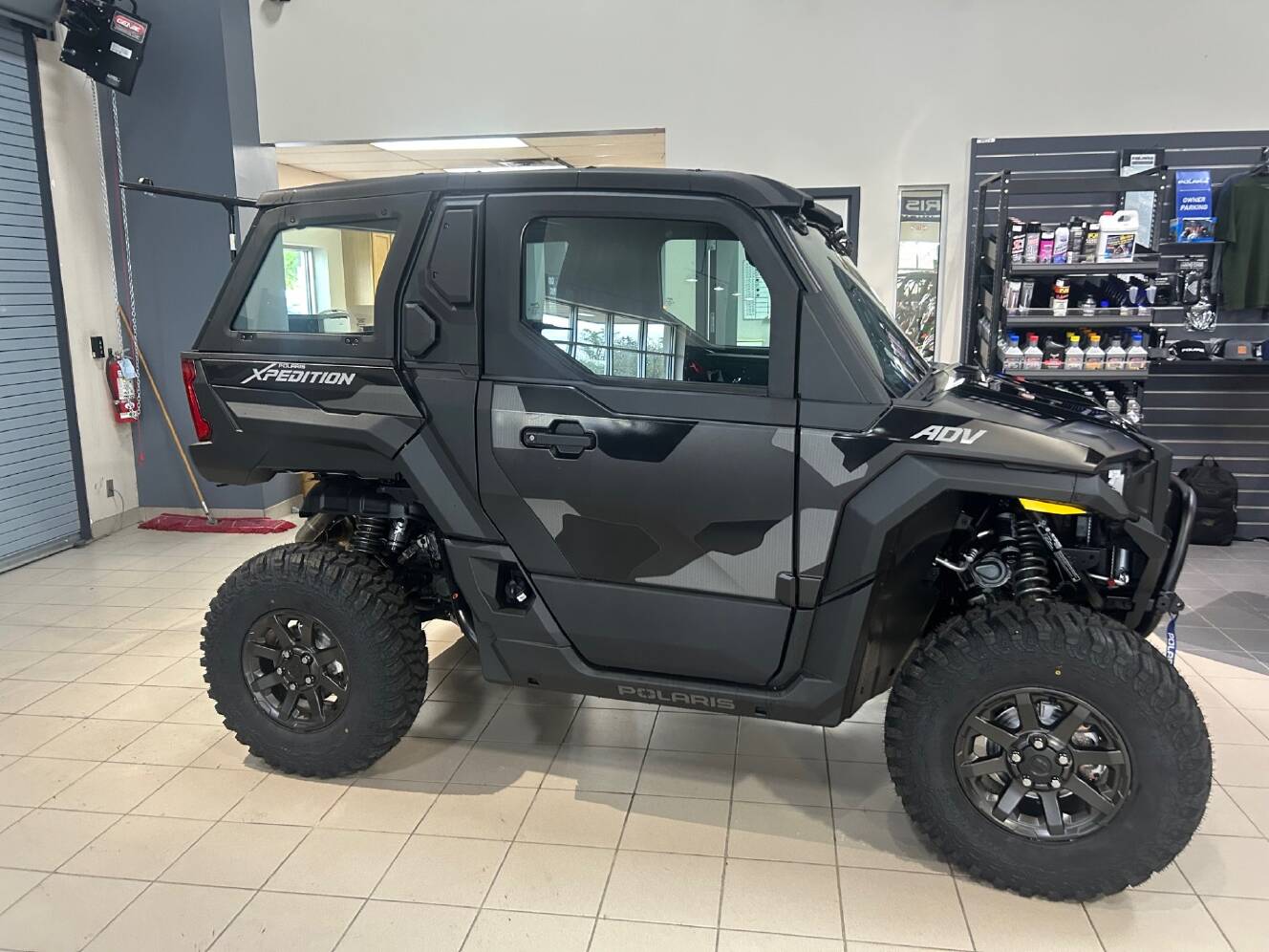 A photo of this 2026 Polaris XPEDITION ADV NORTHSTAR MATTE SUPER GRAPHITE