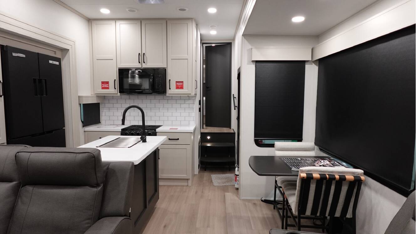 A photo of this 2026 Grand Design MOMENTUM 394G