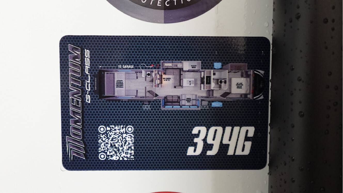 A photo of this 2026 Grand Design MOMENTUM 394G
