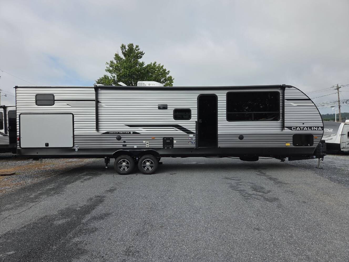 A photo of this 2026 Coachmen Catalina Legacy Edition 343BHTS