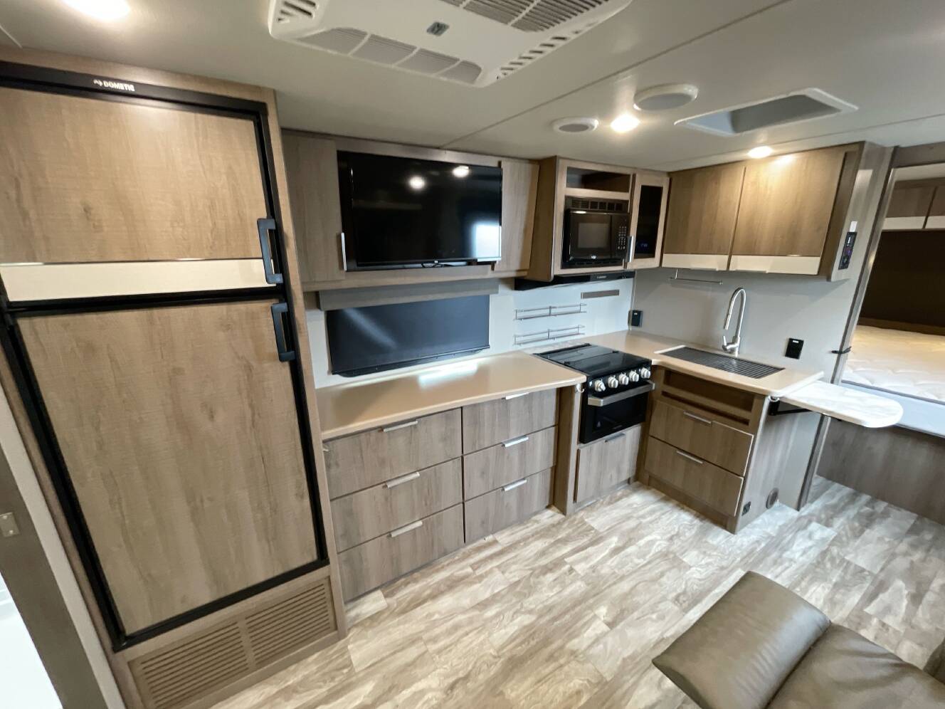 A photo of this 2021 Grand Design IMAGINE XLS 22RBE