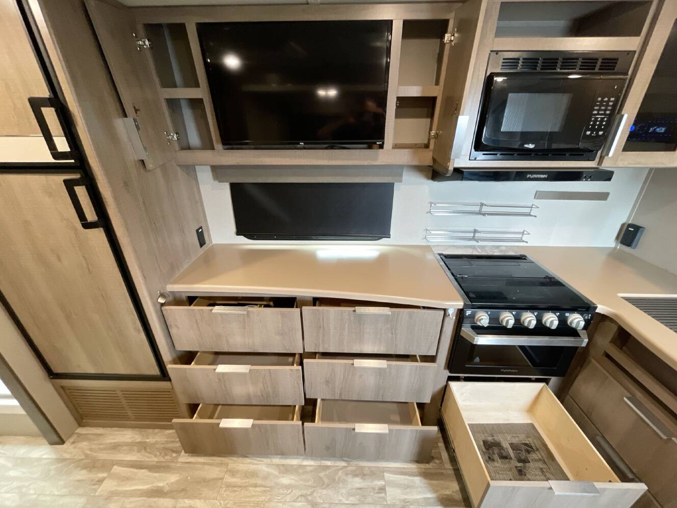A photo of this 2021 Grand Design IMAGINE XLS 22RBE
