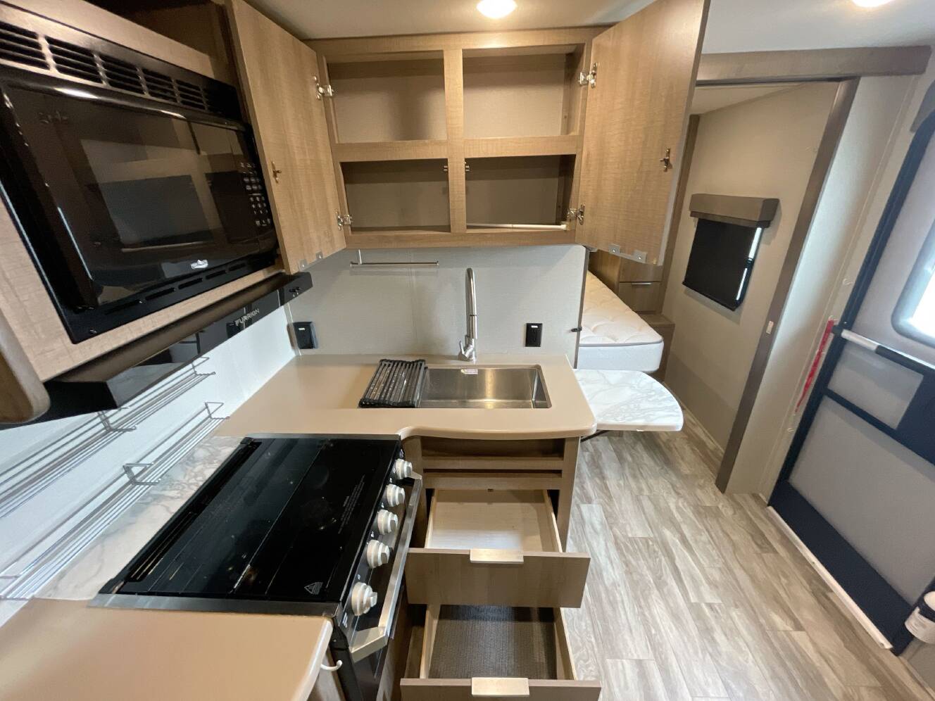 A photo of this 2021 Grand Design IMAGINE XLS 22RBE