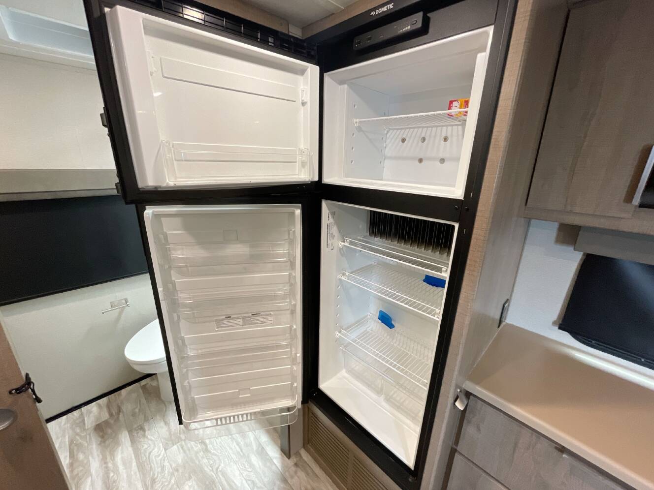 A photo of this 2021 Grand Design IMAGINE XLS 22RBE