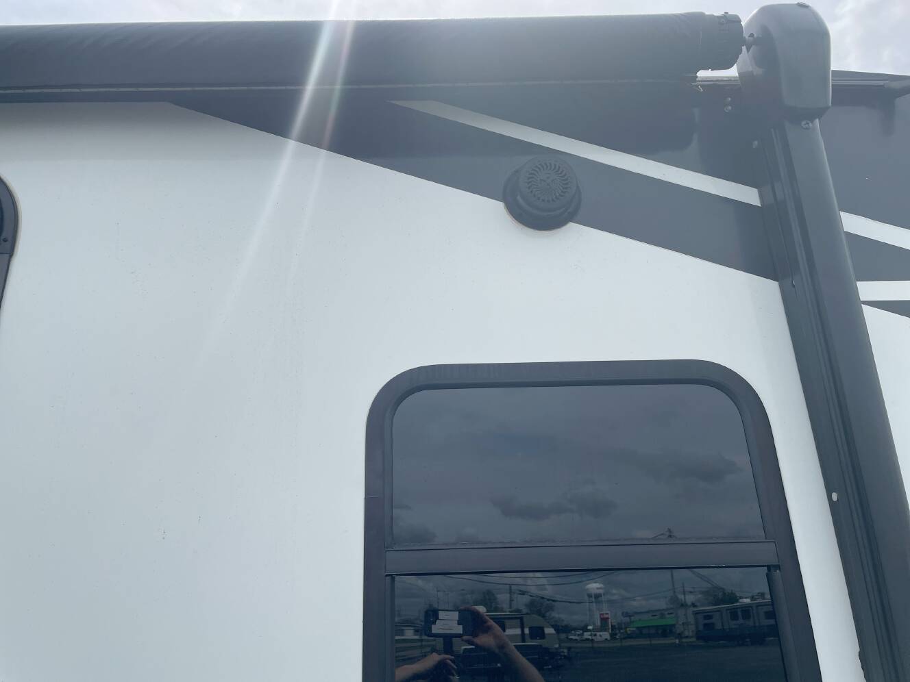 A photo of this 2021 Grand Design IMAGINE XLS 22RBE