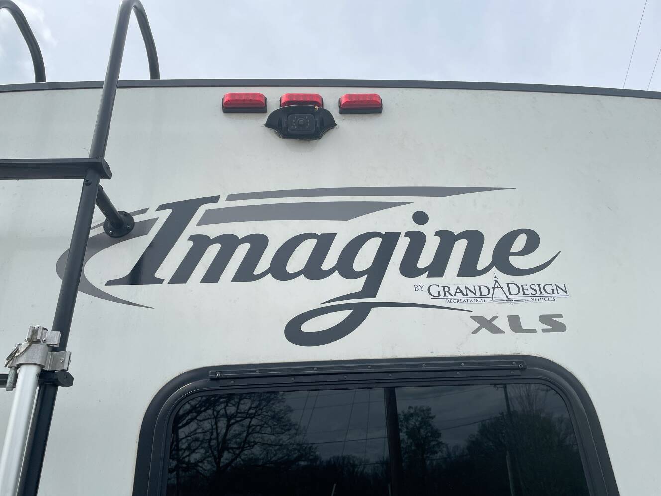 A photo of this 2021 Grand Design IMAGINE XLS 22RBE
