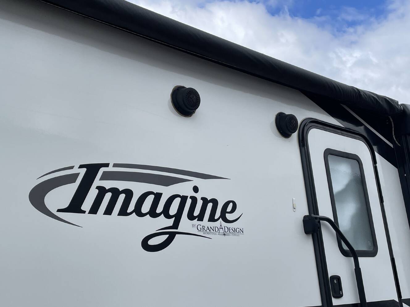 A photo of this 2021 Grand Design IMAGINE 3250BH