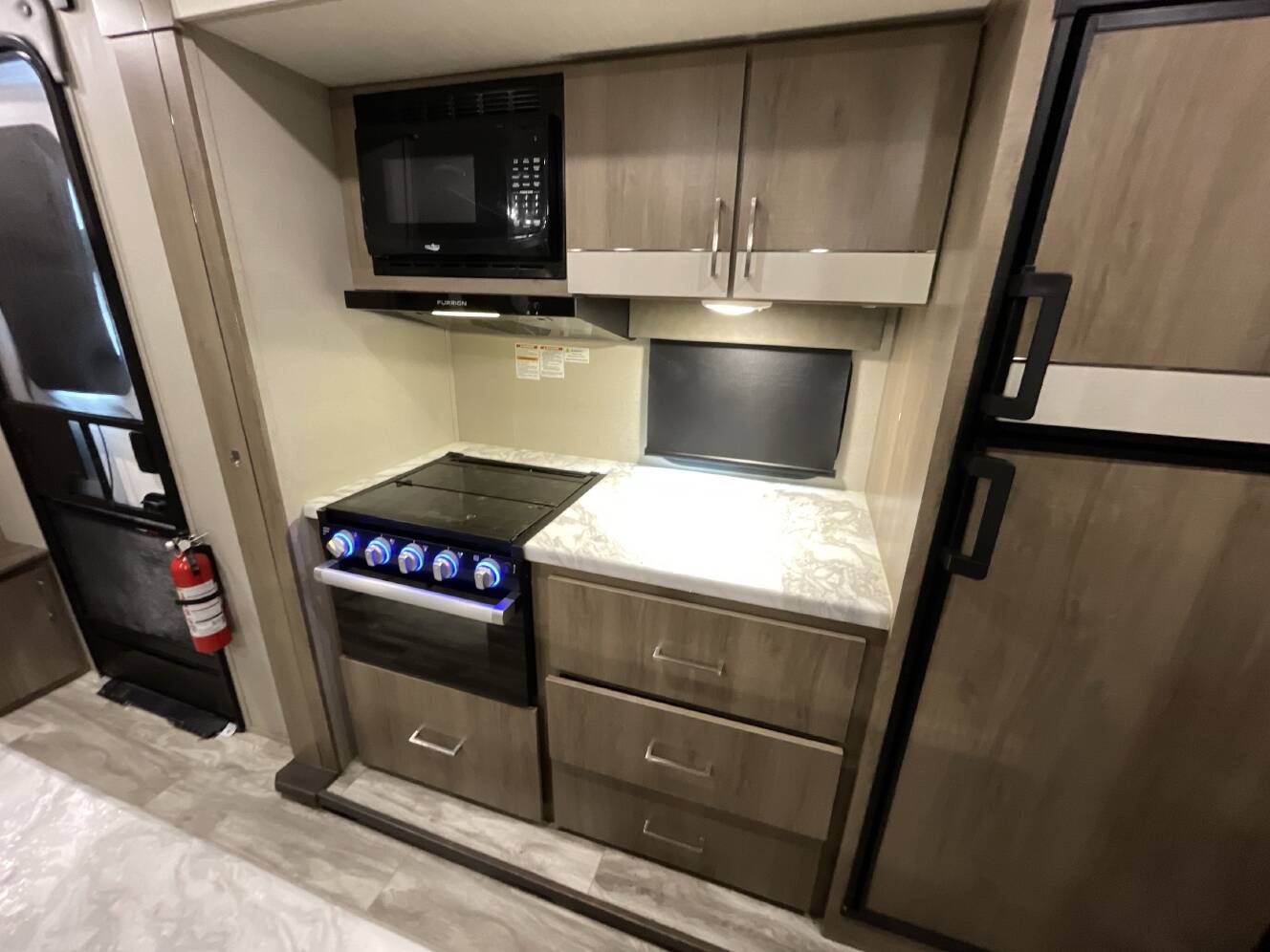 A photo of this 2021 Grand Design IMAGINE 3250BH
