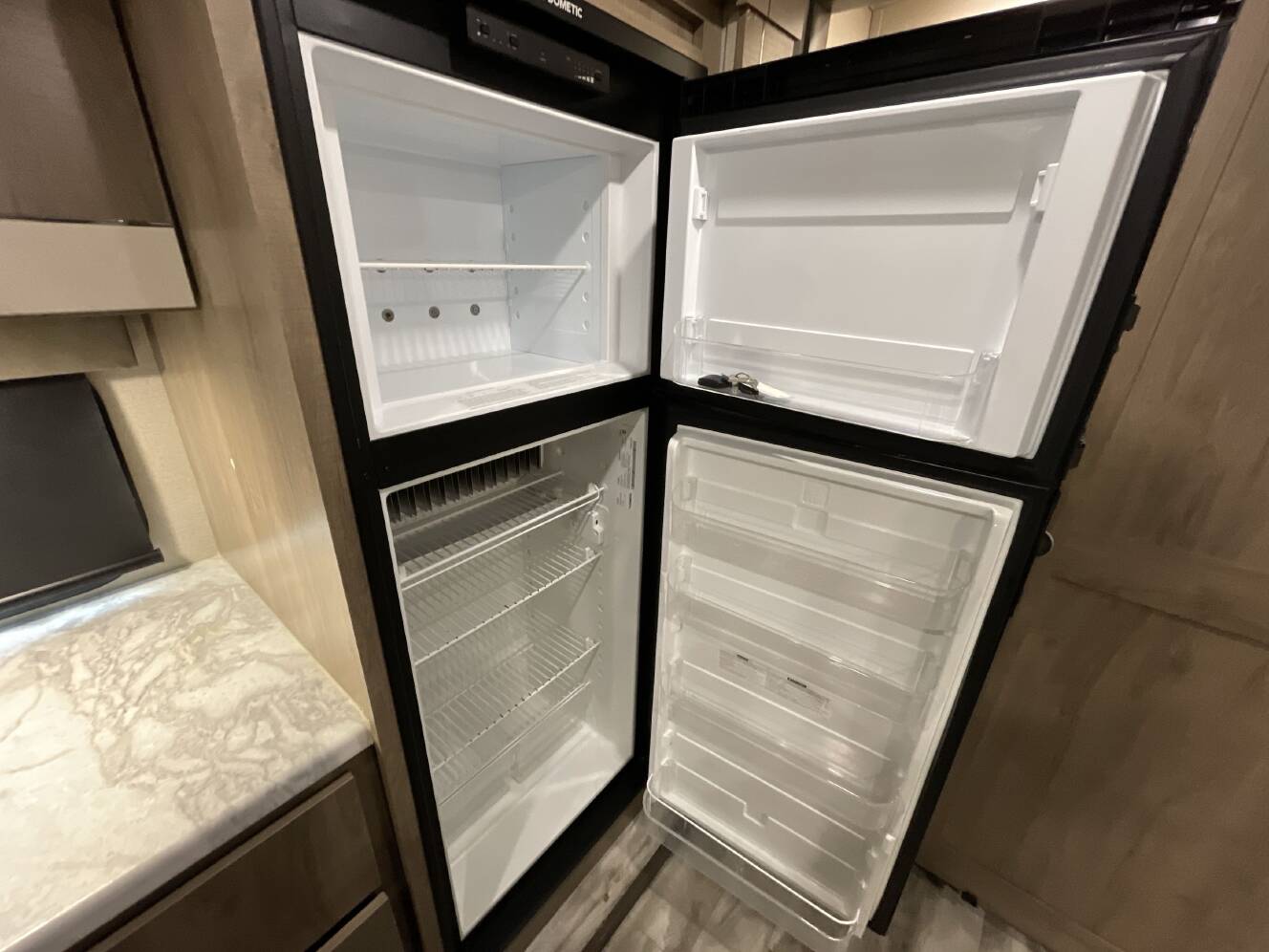 A photo of this 2021 Grand Design IMAGINE 3250BH