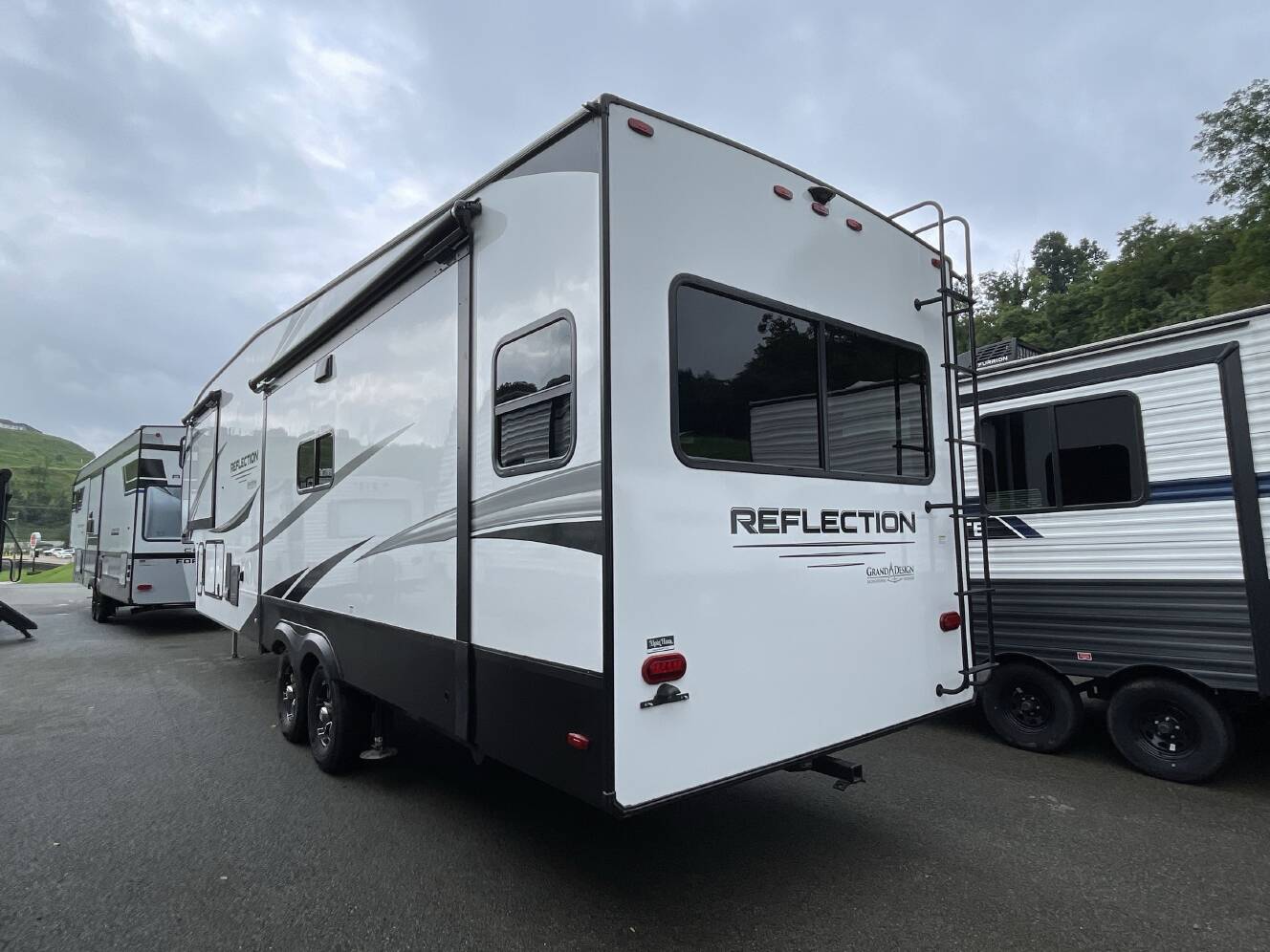 A photo of this 2023 Grand Design REFLECTION 337RLS