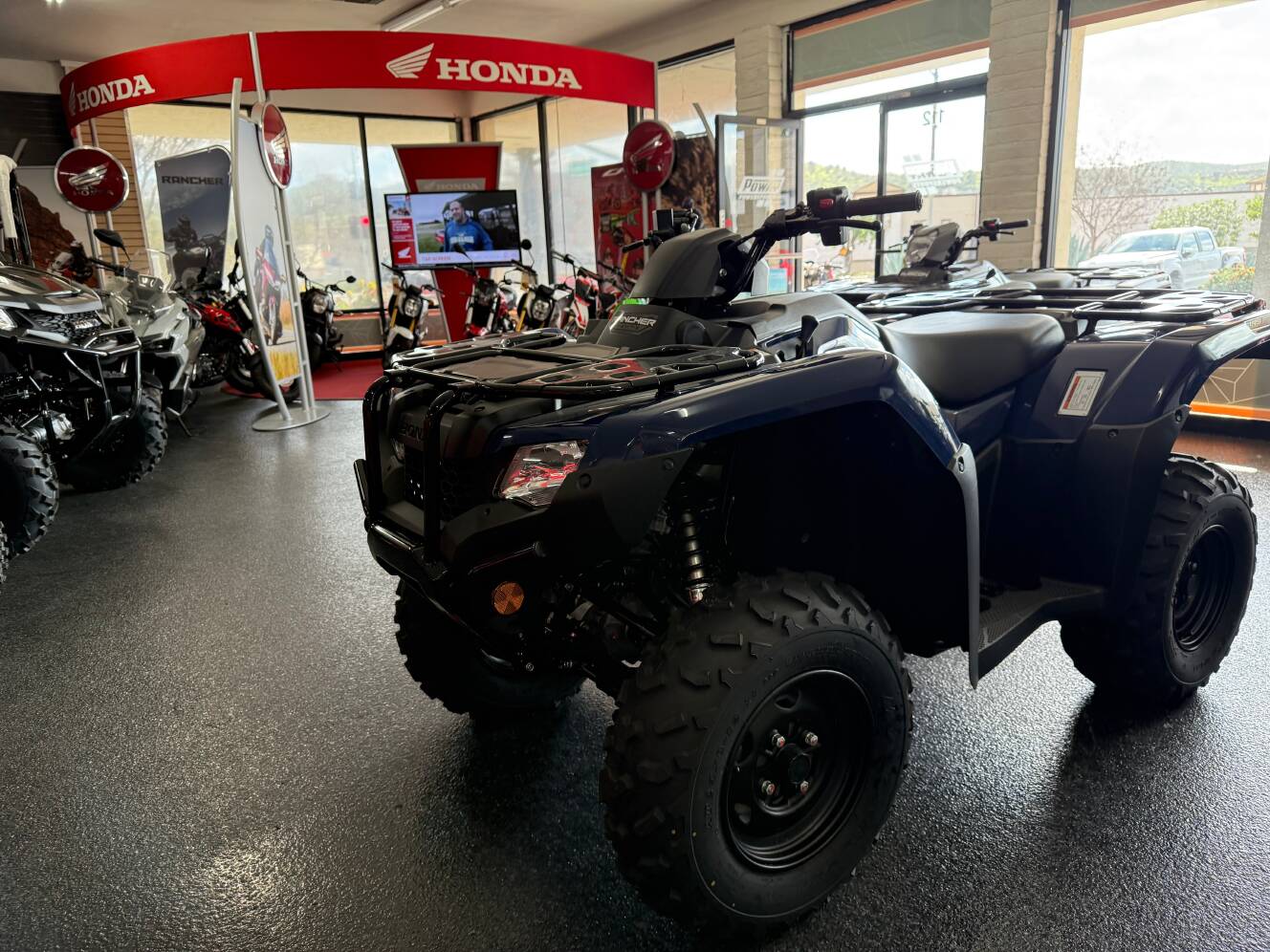 A photo of this 2025 Honda FOURTRAX RANCHER 4x4 AUTO DCT IRS EPS