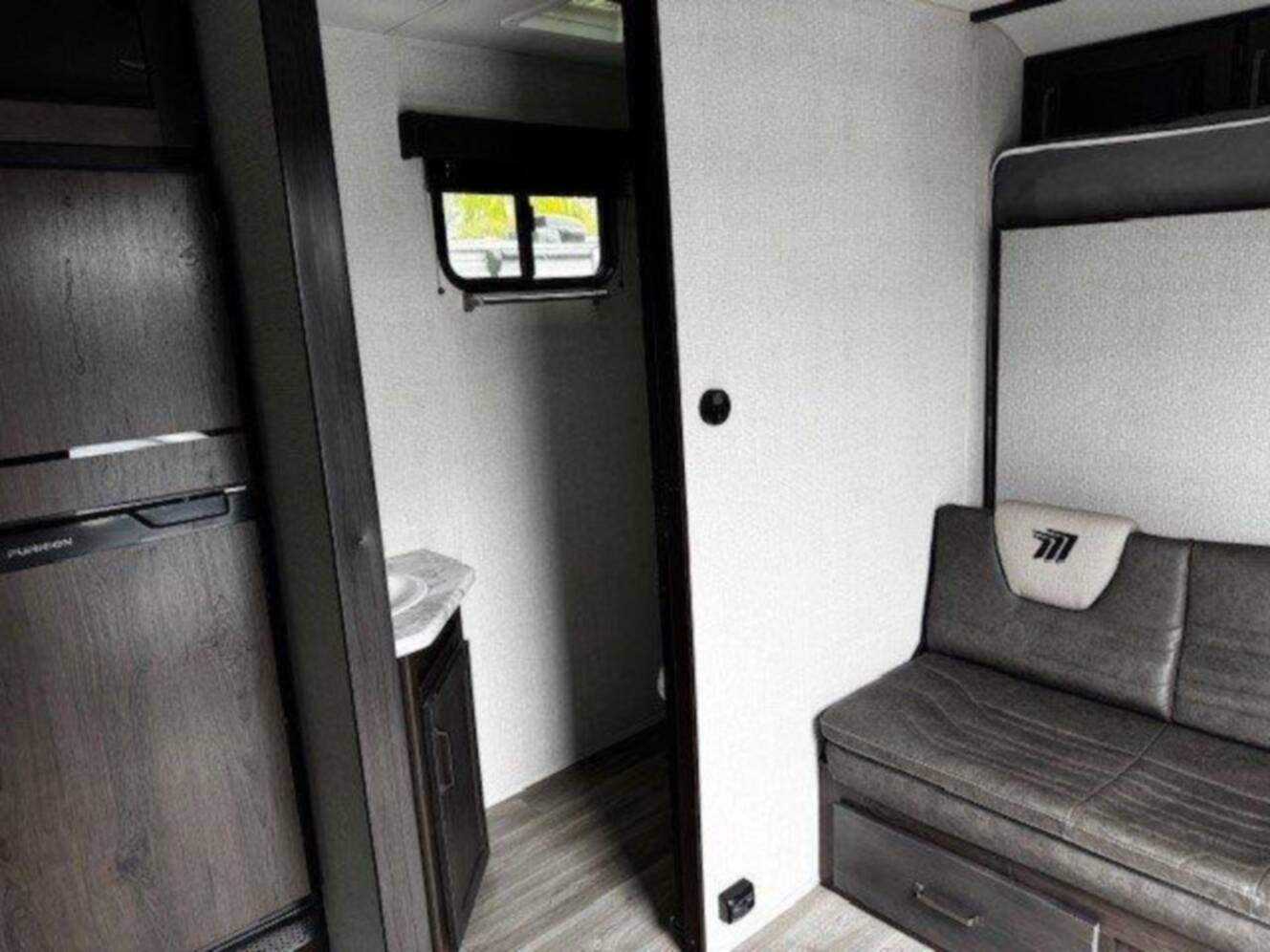 A photo of this 2024 Grand Design Momentum MAV 22MAV