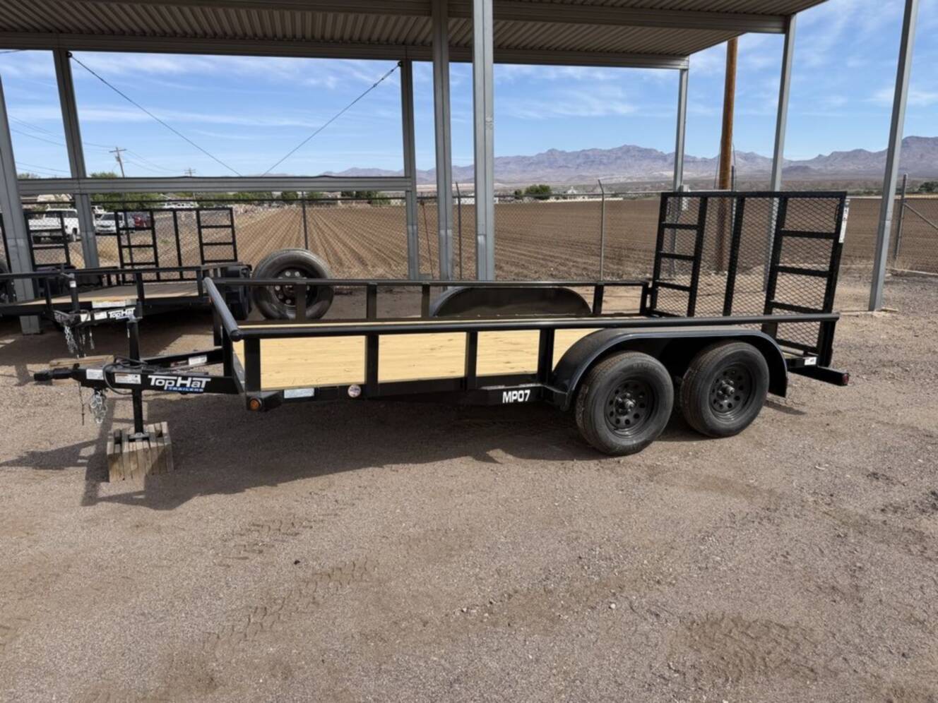 A photo of this 2026 Top Hat Trailers Medium Pipe Utility 14x83" MP