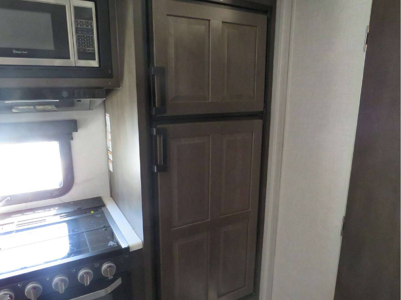 A photo of this 2021 Forest River ROCKWOOD MINI LITE 2507S