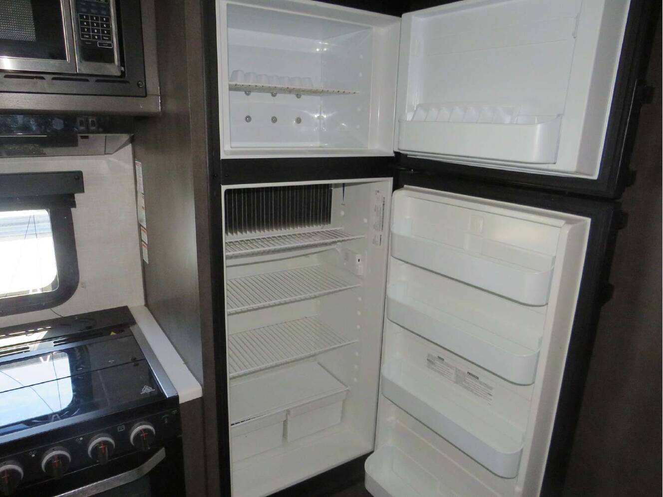 A photo of this 2021 Forest River ROCKWOOD MINI LITE 2507S
