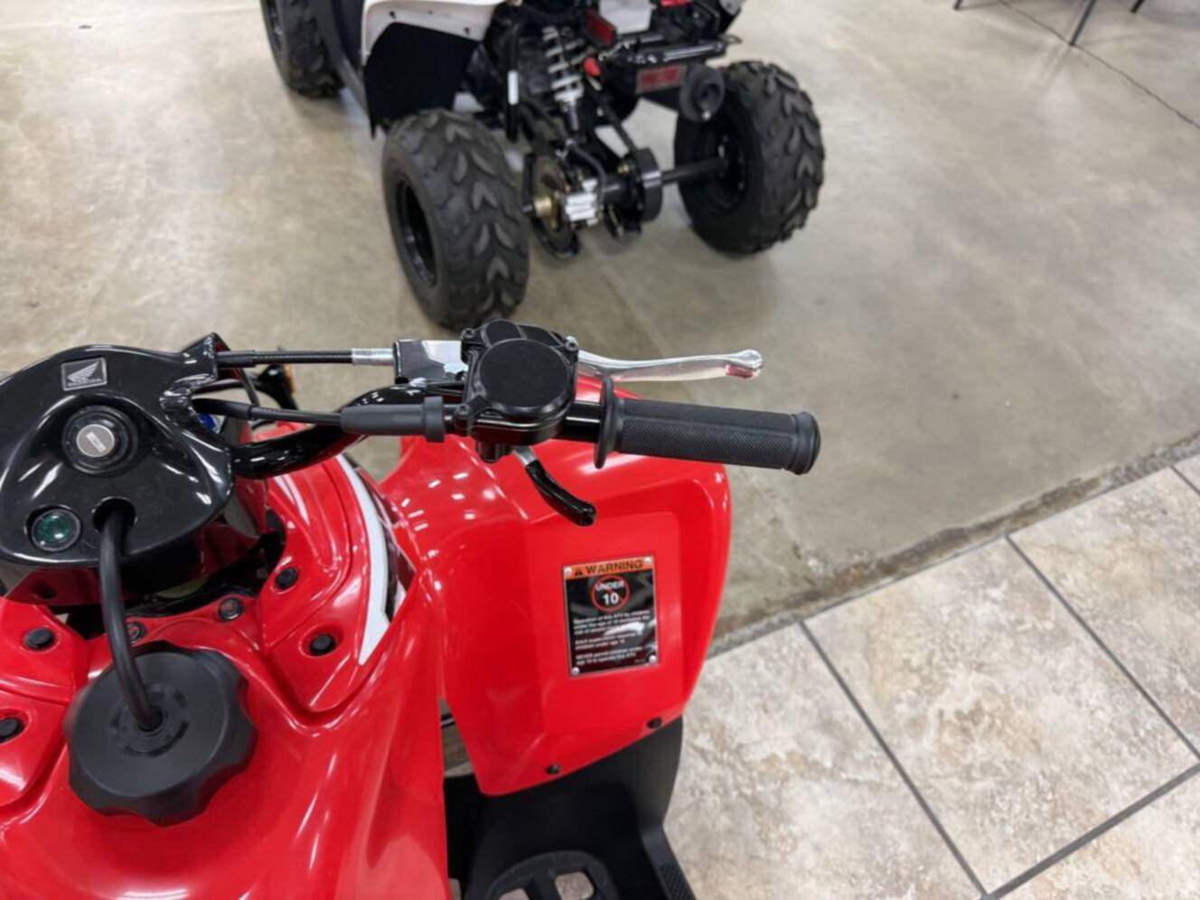 A photo of this 2026 Honda TRX 90X