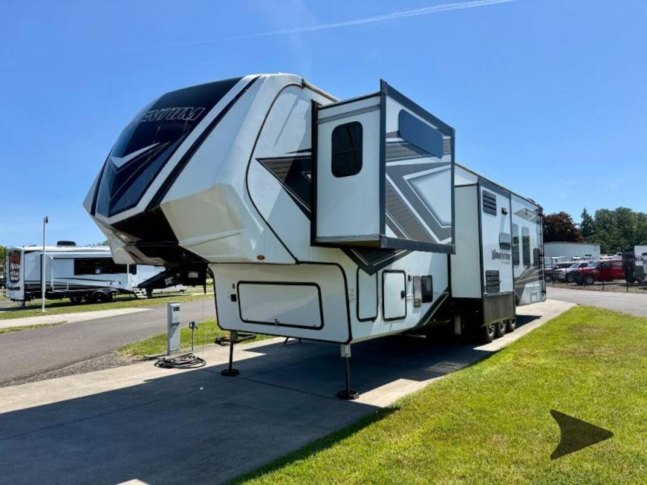 A photo of this 2023 Grand Design Momentum 381MS