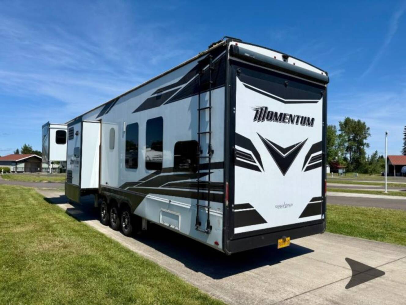 A photo of this 2023 Grand Design Momentum 381MS
