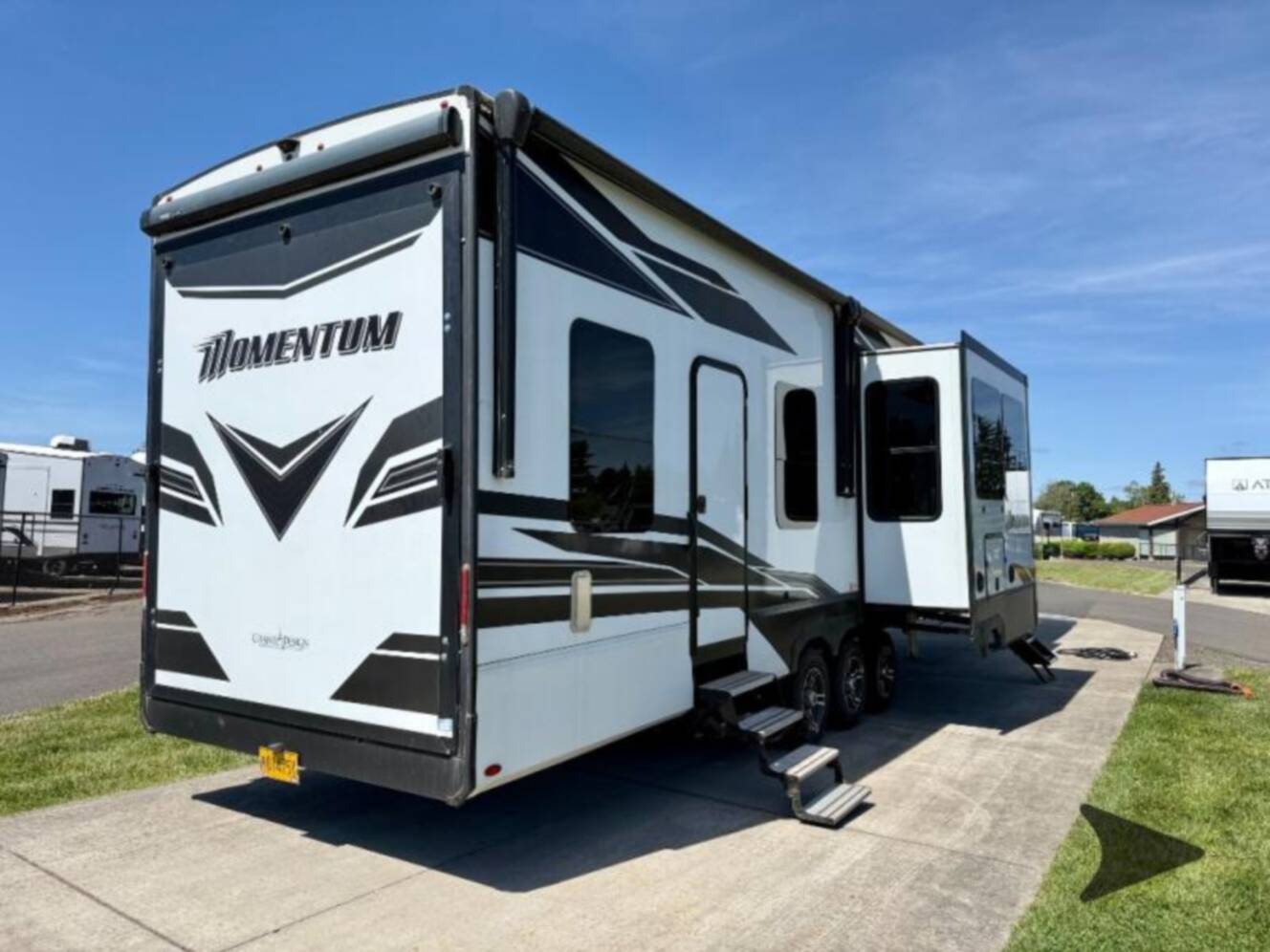 A photo of this 2023 Grand Design Momentum 381MS