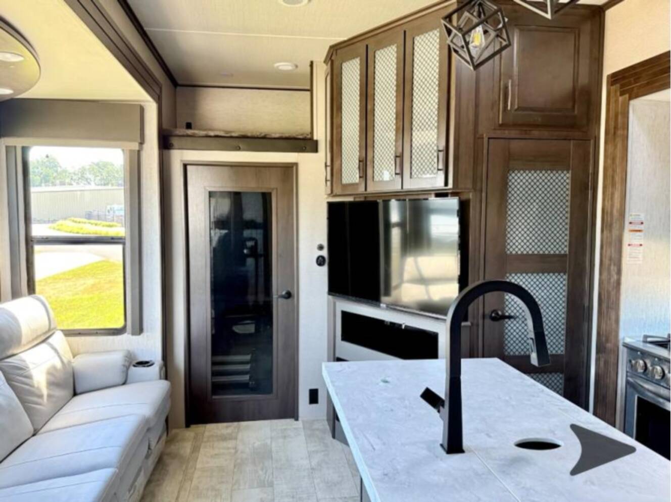 A photo of this 2023 Grand Design Momentum 381MS
