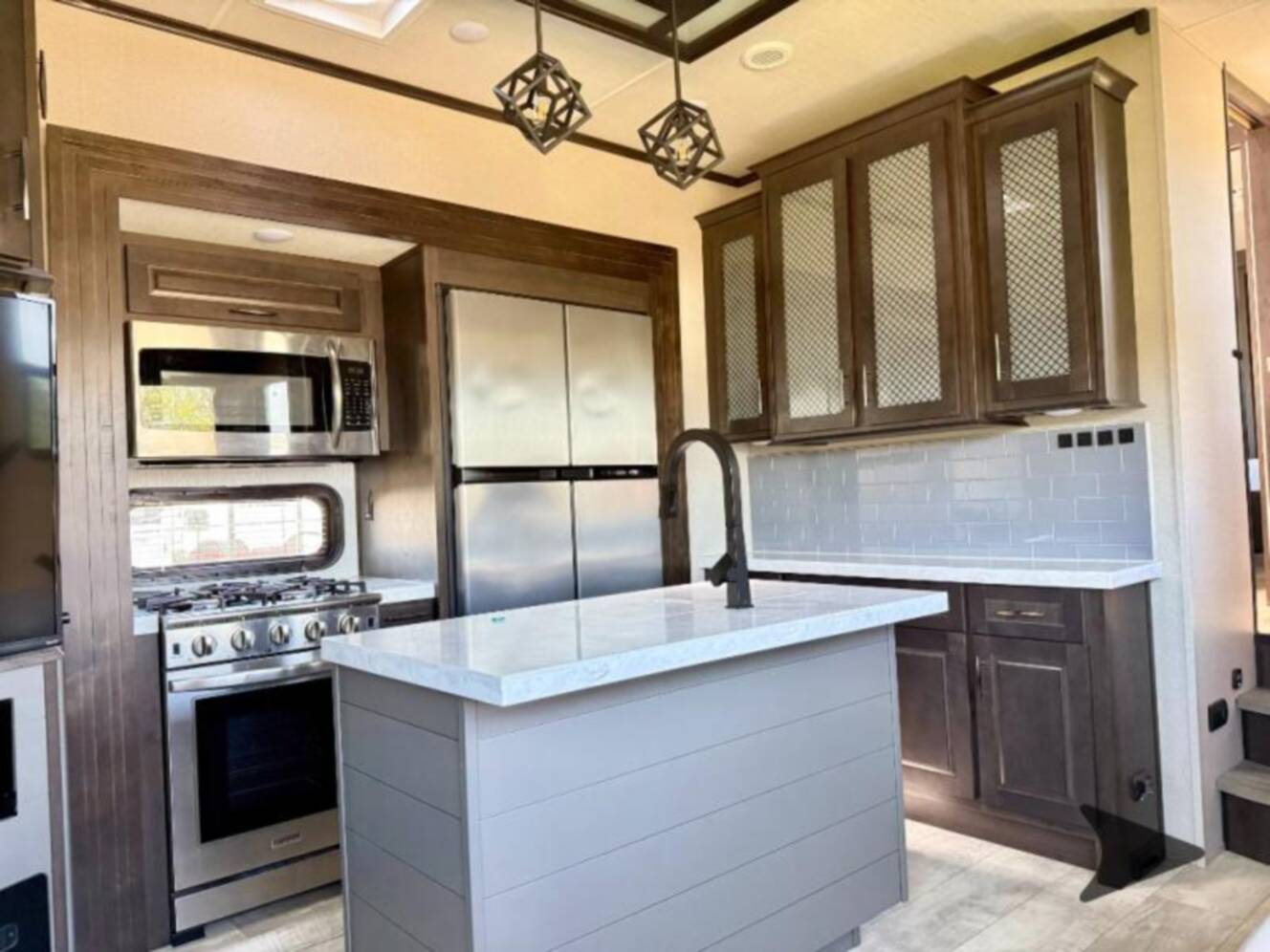 A photo of this 2023 Grand Design Momentum 381MS