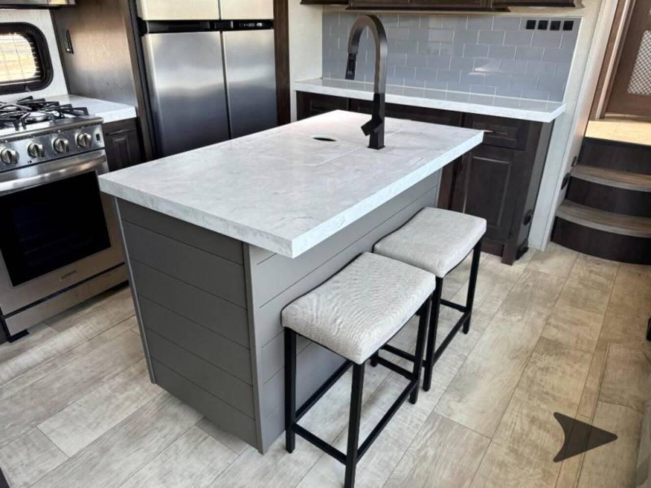 A photo of this 2023 Grand Design Momentum 381MS