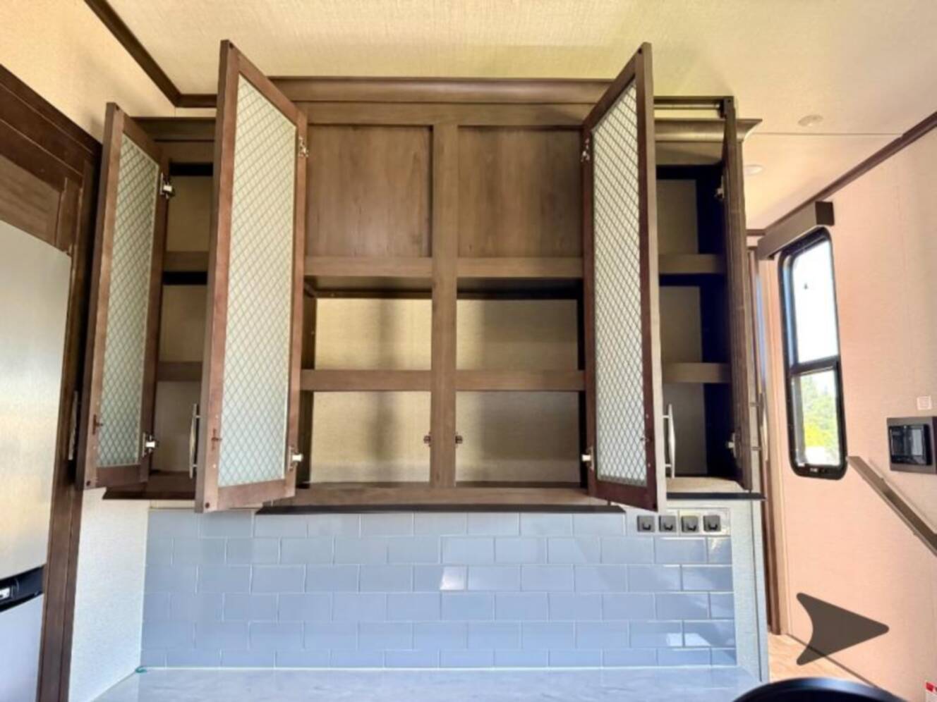A photo of this 2023 Grand Design Momentum 381MS
