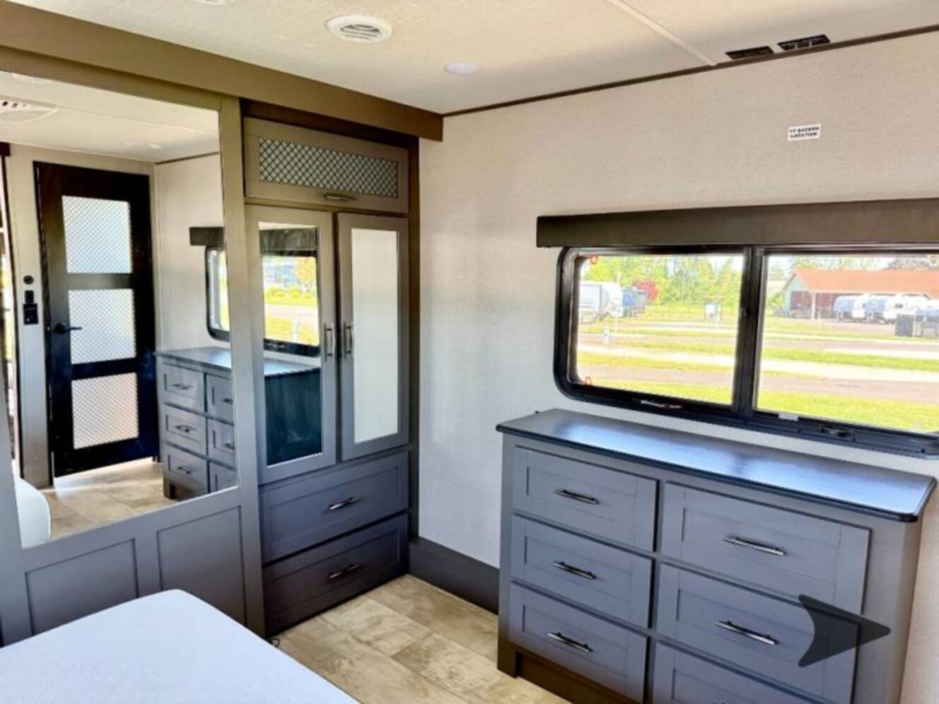 A photo of this 2023 Grand Design Momentum 381MS