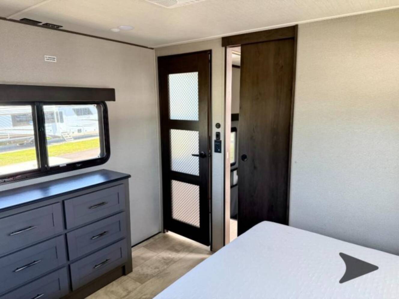 A photo of this 2023 Grand Design Momentum 381MS