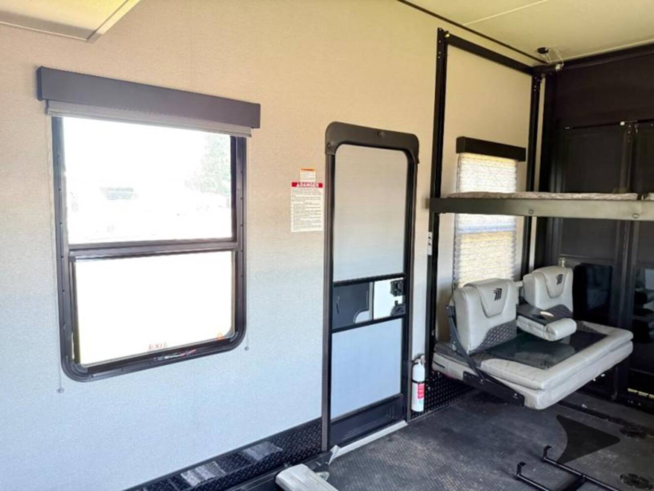 A photo of this 2023 Grand Design Momentum 381MS