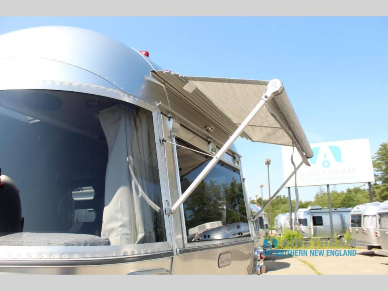 A photo of this 2026 Airstream Trade Wind 25FBQ