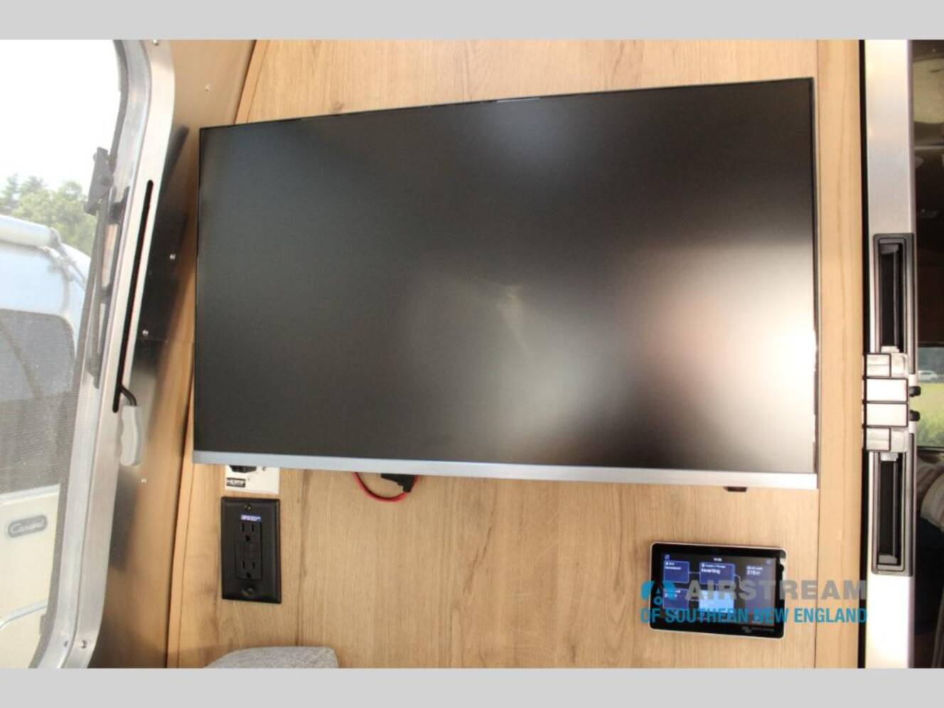 A photo of this 2026 Airstream Trade Wind 25FBQ