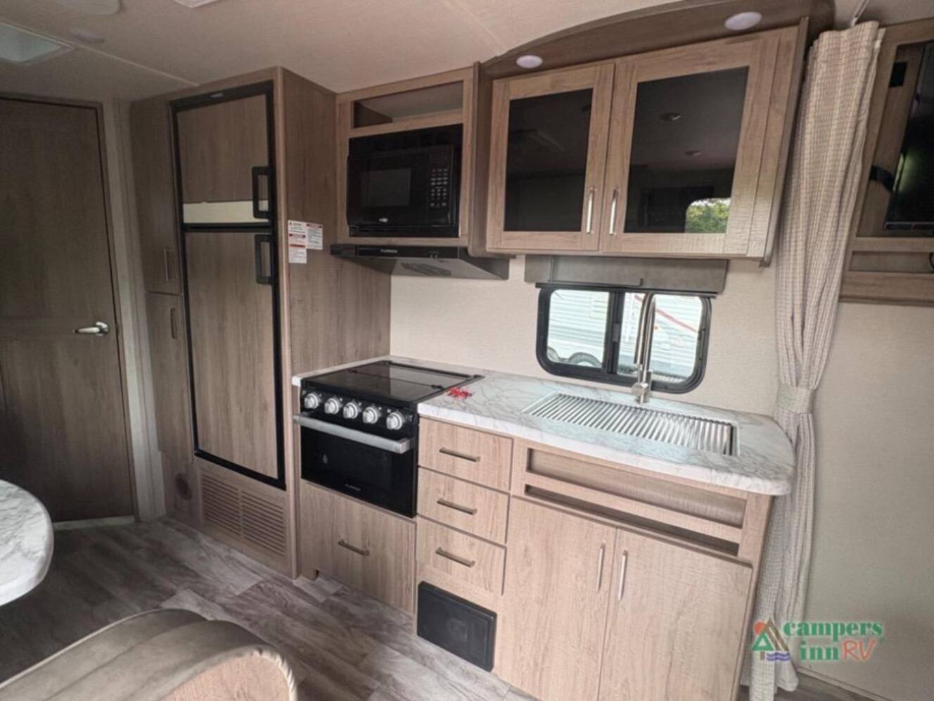 A photo of this 2021 Grand Design Imagine XLS 21BHE