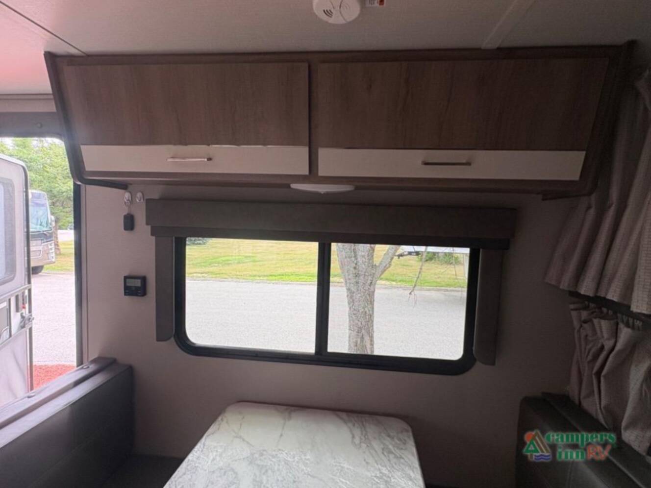 A photo of this 2021 Grand Design Imagine XLS 21BHE