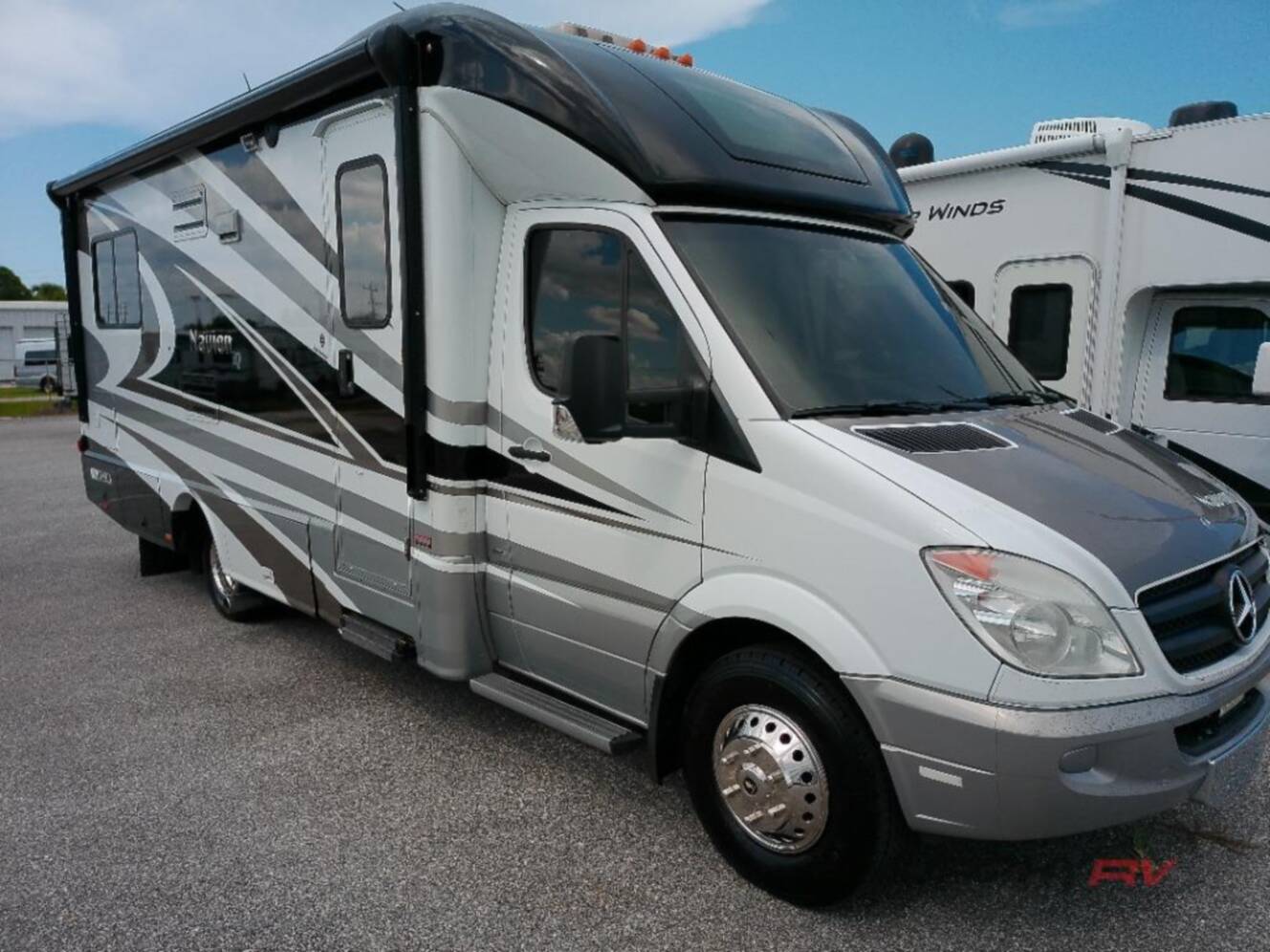 A photo of this 2013 Itasca Navion IQ 24V