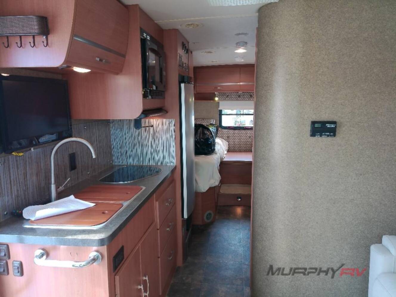A photo of this 2013 Itasca Navion IQ 24V
